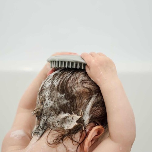 Cepillo de silicona para baño